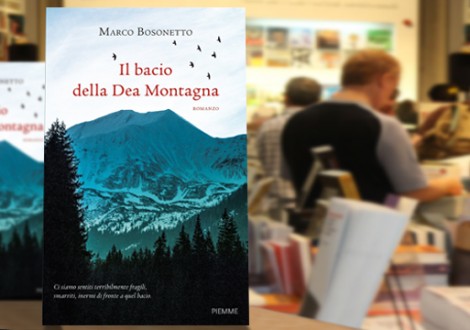 Closeup of man using laptop in cafe grayscale